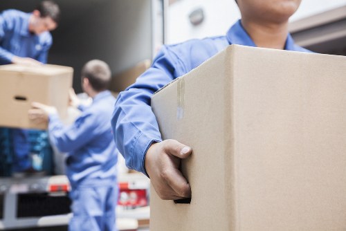Removal team preparing a move in Waterloo with boxes and furniture