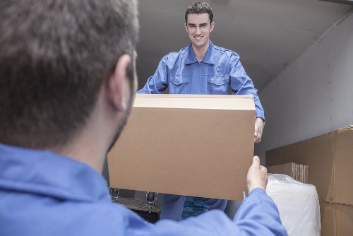 Staff using protective equipment during a removal job