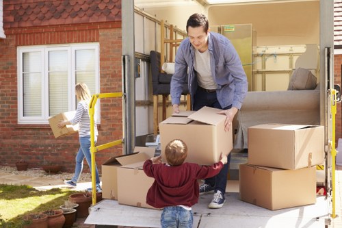 Professional moving team focusing on insurance and safety