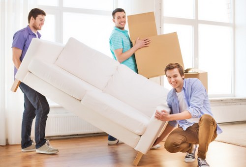Packed boxes and wrapped furniture ready for house removals in Waterloo