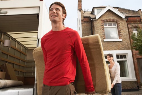 Packed office furniture and equipment ready for relocation